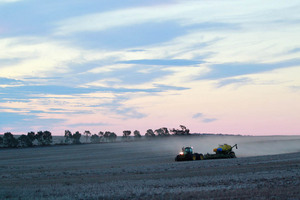 Harvester in the Mallee on sunset in Victoria